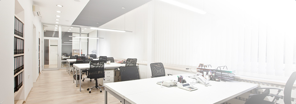 Modern office interior kept comfortable by a wall-mounted air conditioning unit