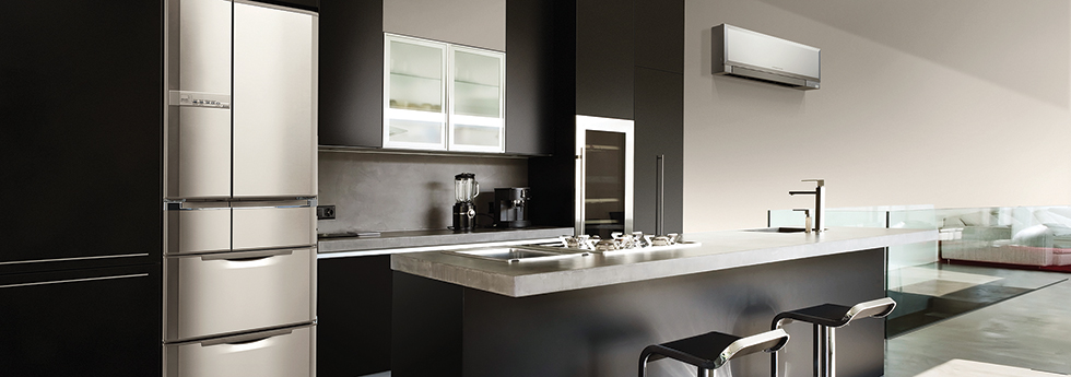 Modern kitchen with a wall-mounted heat pump unit above the bench